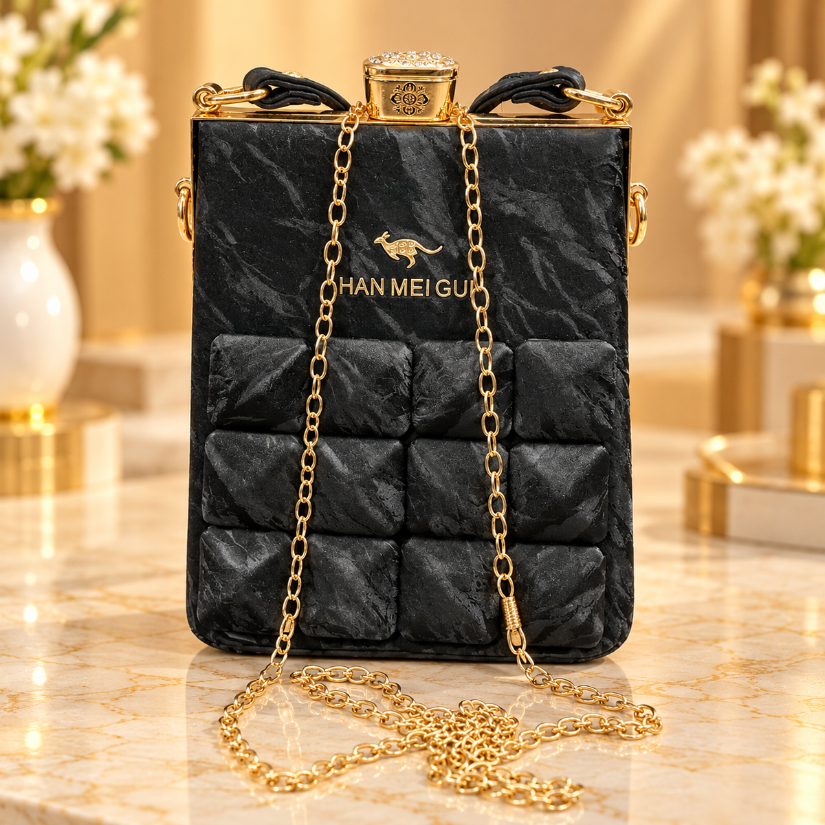 Luxury Black Padded Handbag with Gold-Tone Hardware