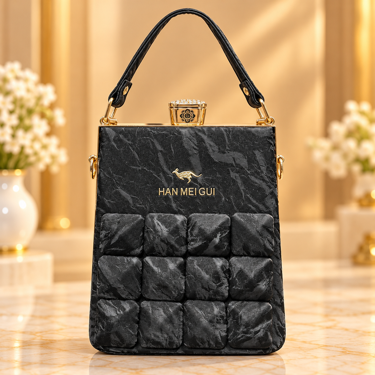 Luxury Black Padded Handbag with Gold-Tone Hardware