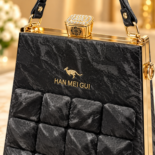 Luxury Black Padded Handbag with Gold-Tone Hardware